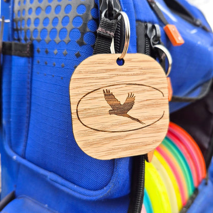 Customized wooden logo tag on disc golf bag ash